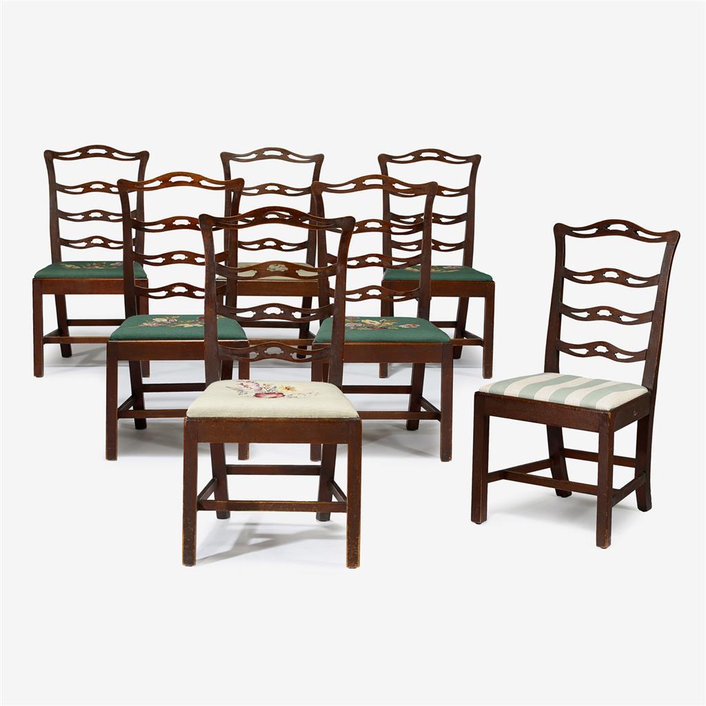 Seven Federal mahogany ribbon-back side chairs 
probably maryland, circa 1800 
Each with four arched pierced slats on molded seat rail, square turned legs joined by stretchers. 
H: 49 in. 
PROVENANCE:  Property of a West Virginia collector.