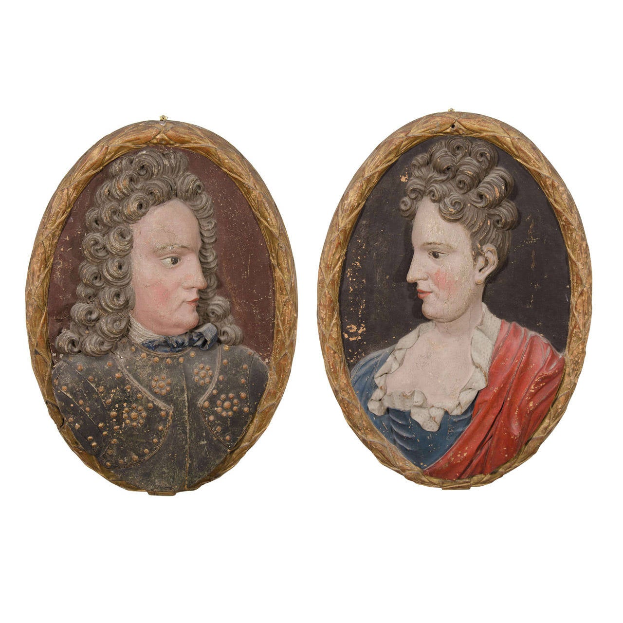 Set of 18th Century Carved Wood Plaques of a Man and Woman
