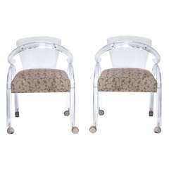 A Mid Century Pair of Lucite Armchairs on Casters 7