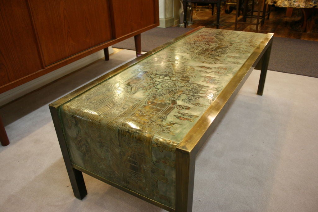 A rare, signed Phillip and Kelvin LaVerne waterfall coffee table. Etched bronze with pewter. From the 