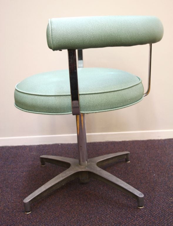 American Pair of Mid Century Chrome and Teal Vinyl Swivel Chairs
