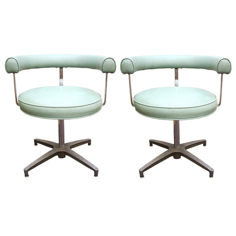 Pair of Mid Century Chrome and Teal Vinyl Swivel Chairs