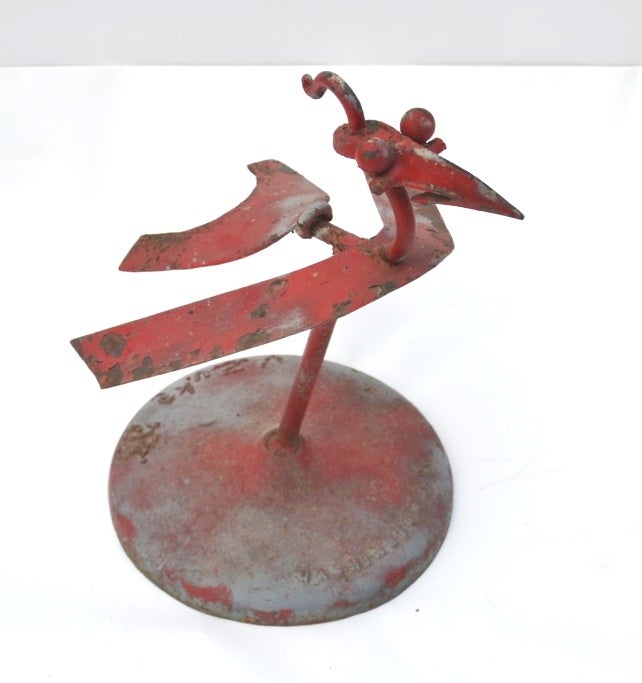 A vintage abstract folk art sculpture of a red rooster or other bird. The piece is composed or iron objects and has Washington D.C. stamped on base.  Signed and dated.