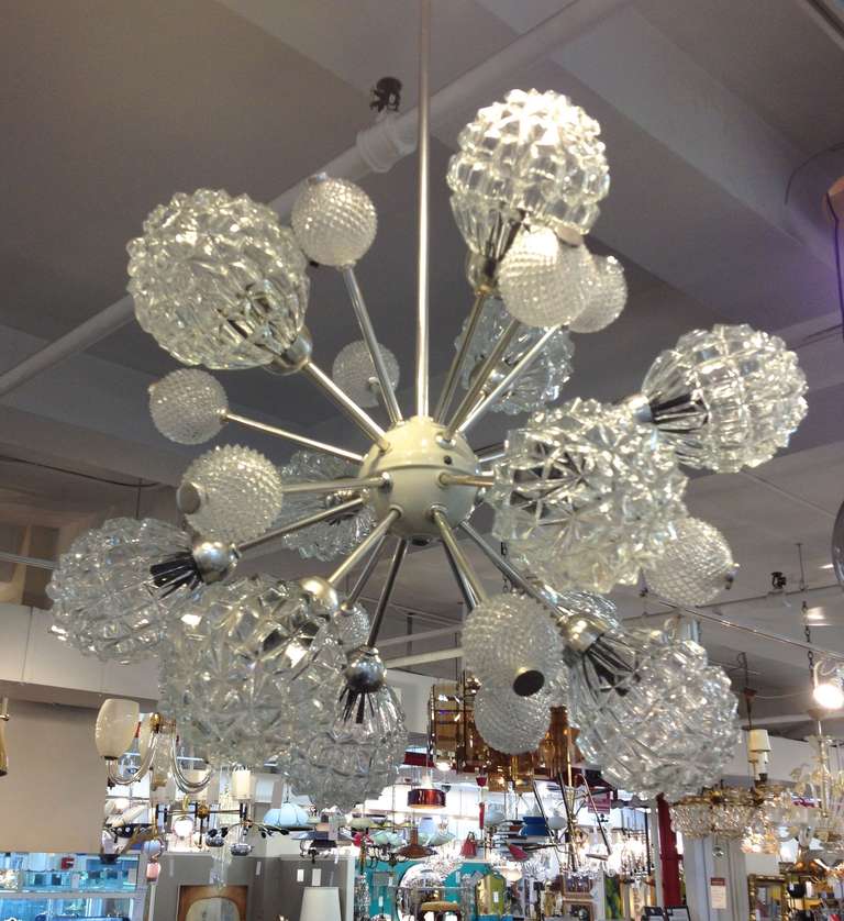 A vintage chrome and textured glass bubble Sputnik chandelier by Richard Essig, produced, circa 1970s. Ready to hang with E12 European to E14 American candelabra socket adapters. Good vintage condition with age appropriate wear.