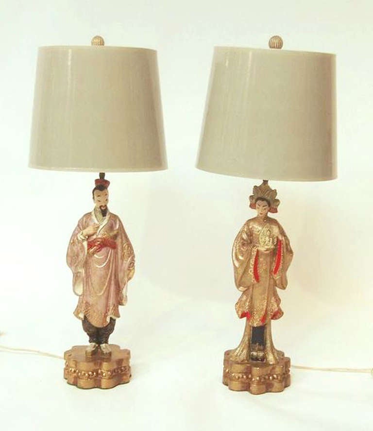 A pair of vintage table lamps with painted figural bodies depicting a man and woman.

Reduced from: $950