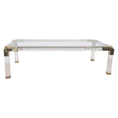 Charles Hollis Jones Style Coffee Table with Lucite Frame Beveled Brass Corners