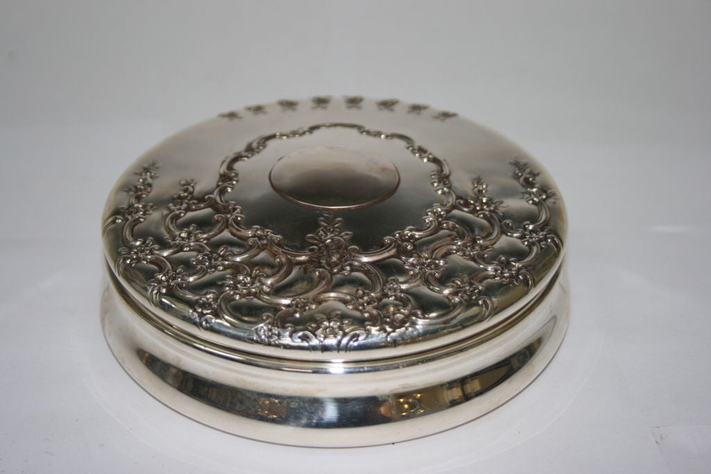 A sterling silver jewelry box by Tiffany & Co. with Rococo design. Fitted in green velvet. Fully marked.
