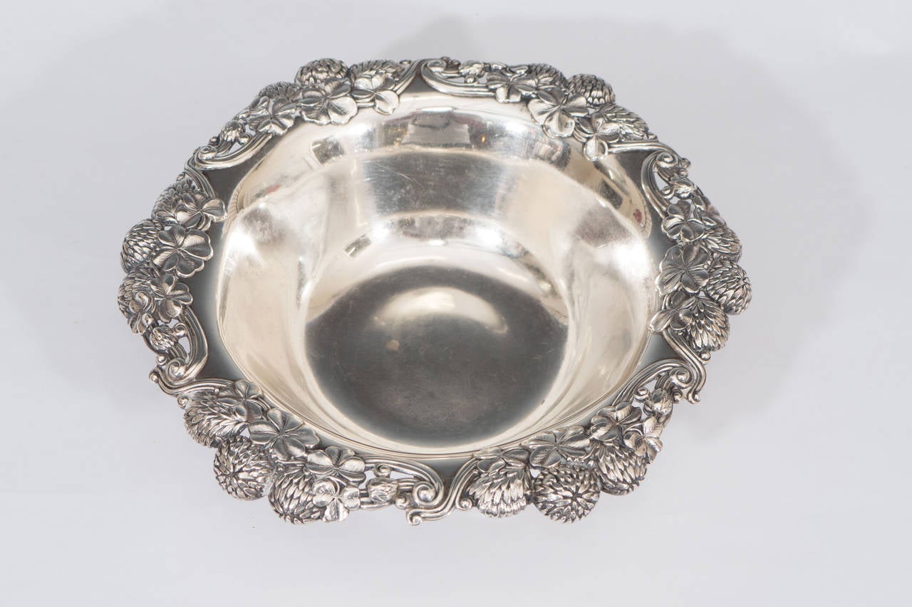 An Art Nouveau Tiffany & Co. sterling silver bowl with raised intricate shamrock and thistle border. Marked on the reverse Tiffany & Co. 38780 Makers 3744 Sterling Silver 9 2 5 - 1000. Weight upon request. 

Good condition with age appropriate
