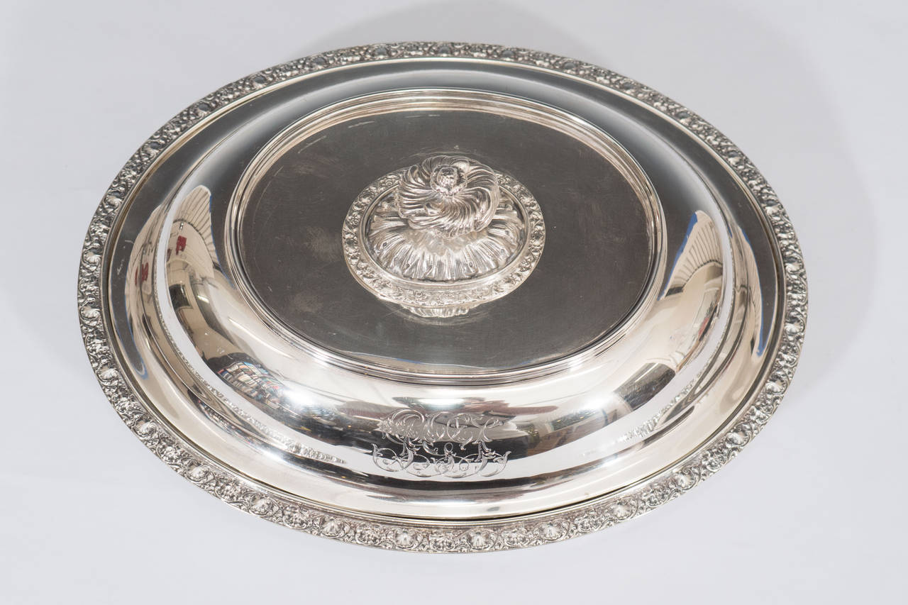 A pair of oval Tiffany & Co. makers covered vegetable dishes in sterling,
silver with palmette borders. Marked on reverse Tiffany & Co. 7545 makers 2548 sterling silver 9 2 5 - 1000. 