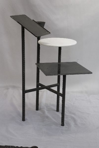 Pair of marble and iron multi-level telephone tables custom designed by Phillipe Starck for the Royalton Hotel, ca. 1980s. Two tiers in black and white marble respectively and a tilted telephone stand.