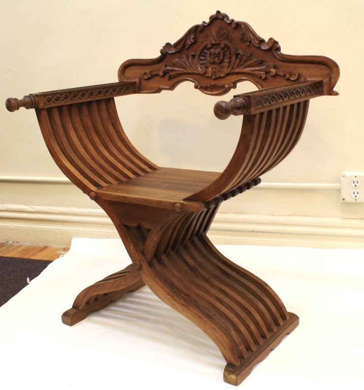 Pair Ornate Handcarved Teak Curule Chairs In Excellent Condition In New York, NY