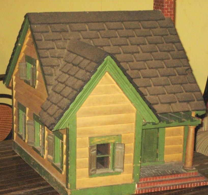 A charming architect's model of a country house; all original.  Asphalt roof, hand-painted brick chimney and stone wall, glass windows.  No floor but wood beams on bottom.