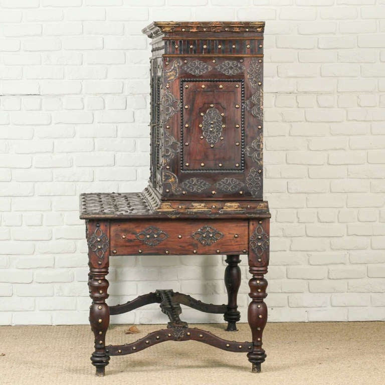 Very rare and unique Anglo-Dutch style solid jackfruit cabinet with elaborate brass details and ebony inlay. Table has three drawers with brass handles and ebony inlay. Top cabinet has ebony inlaid doors and ebony dental inlay on top frieze. Every