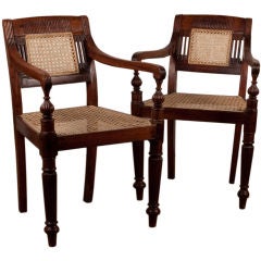 Pair of Anglo-Indian Rosewood Armchairs with Caned Seat and Back