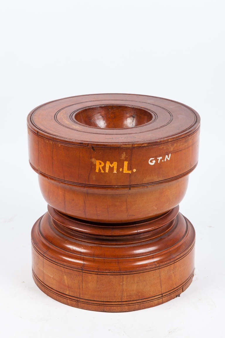 Solid satinwood rice grinder from Southern India. Rice was poured into the top concavity and pounded into flour using a heavy wooden pole. They make great side tables. Have others available as well.