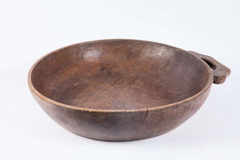 Wood bowl from the Philippines. Total width with handle is 29