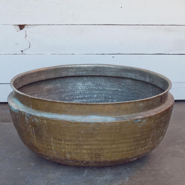 Large sized solid brass Indian pot traditionally used for cooking. Would make a great flower pot or outdoor fire pit.
