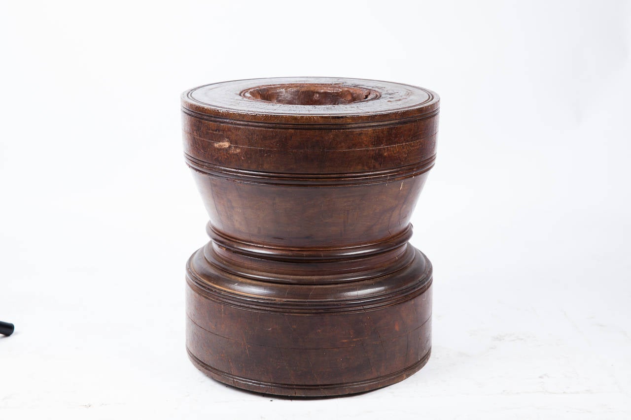 Solid wood rice grinder from Southern India, rice was poured into the top concavity and pounded into flour using a heavy wooden pole. Makes a great side or drink table. Others are available.