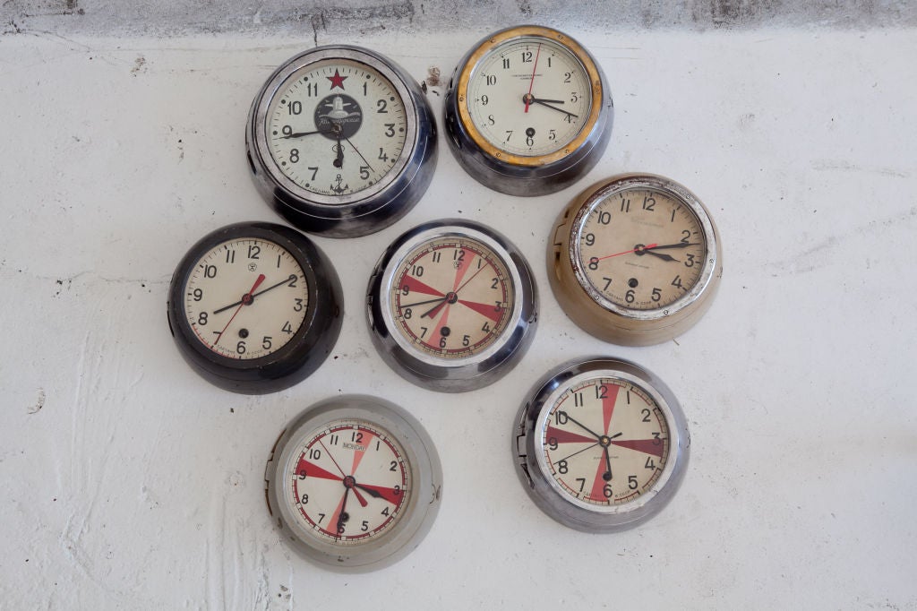 Cast aluminum wall clocks from decommissioned former Soviet Union ships. Clocks have heavy duty cast aluminum bodies which open with special key. Clocks need to wound, but will tell time for approximatelyly eight days on a single wind. A variety of