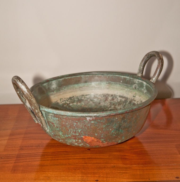 Copper cooking pot from Ceylon with large side handles. The metal has a beautiful patina.