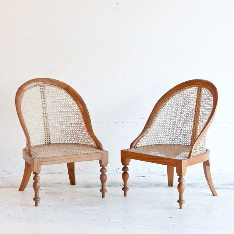 Solid satinwood Anglo-Indian low chairs with nicely curved arms Caned back and seat. Seat height = 14