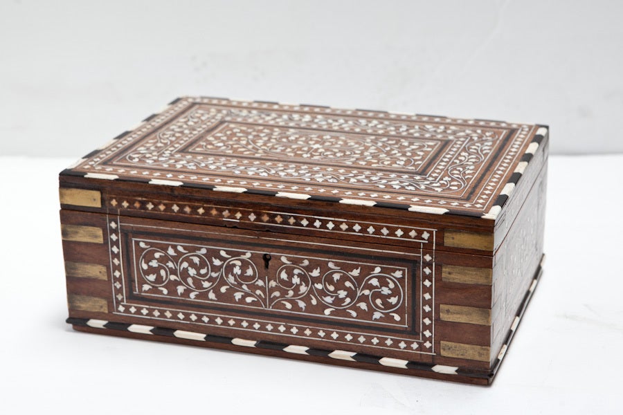 Anglo-Indian rosewood dressing box with elaborate inlay. Brass protective corner hardware. Inside has several compartments and original mirror.