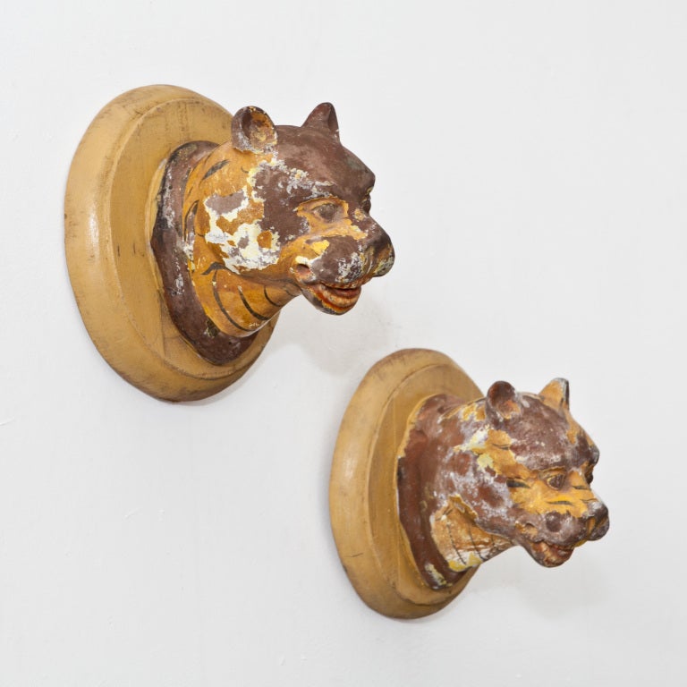 Ceramic tiger heads on yellow wooden wall mount from India. Great facial details.
