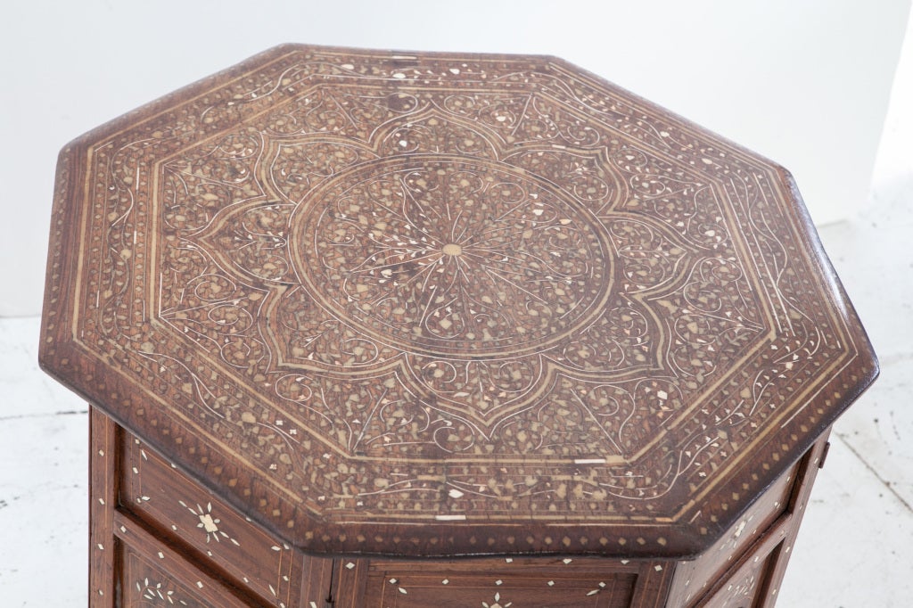 Anglo-Indian rosewood folding octagonal table with inlay on base and top.