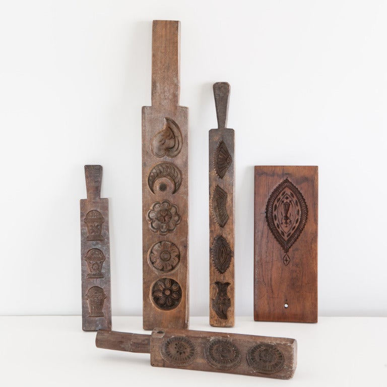 Wood paddles used for baking molds from Indonesia. Sold as a set.