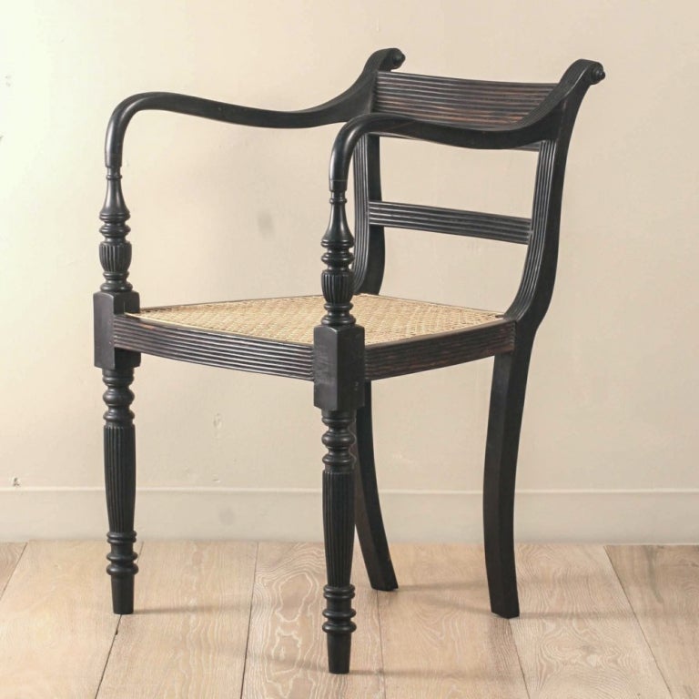 Anglo-Indian Ebony Raffles Armchairs