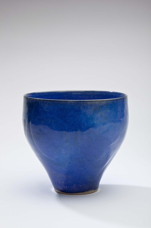 The work of Rudulf Staffel (1911-2002) rarely comes on the markete.  This early glazed earthenware bowl is outstanding for its intense blue glaze and delicate shading.  Examples of Staffel's pottery are on view at the Philadelphia Museum of Art