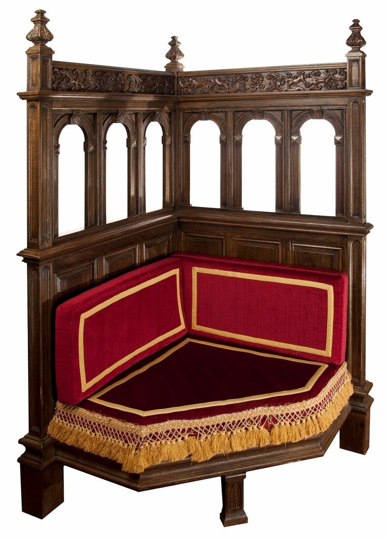 Theses deeply hand-carved mahogany corner pews with arcs and symbols were brought from Italy to adorn a certain castle in Miami. The thickly pillowed cushions are original as that in the vatican.
