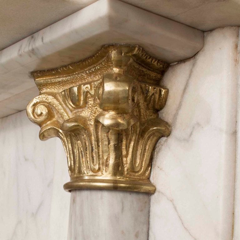 Solid marble with brass fixtures.