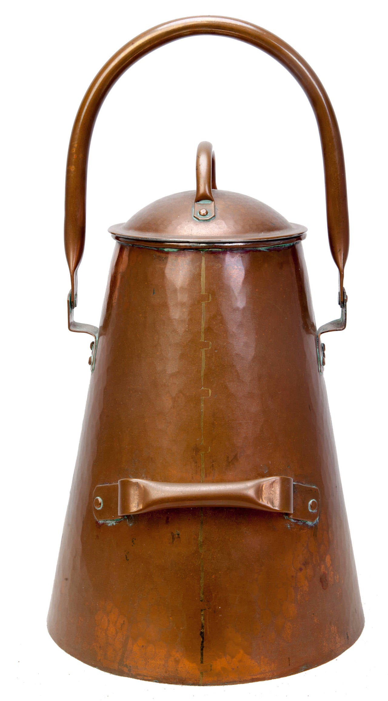 Unusually large hand-hammered coffee pot. Collapsible loop handle on top for lifting, bail handle on backside for pouring and a small loop handle on the lid, with tin lining.