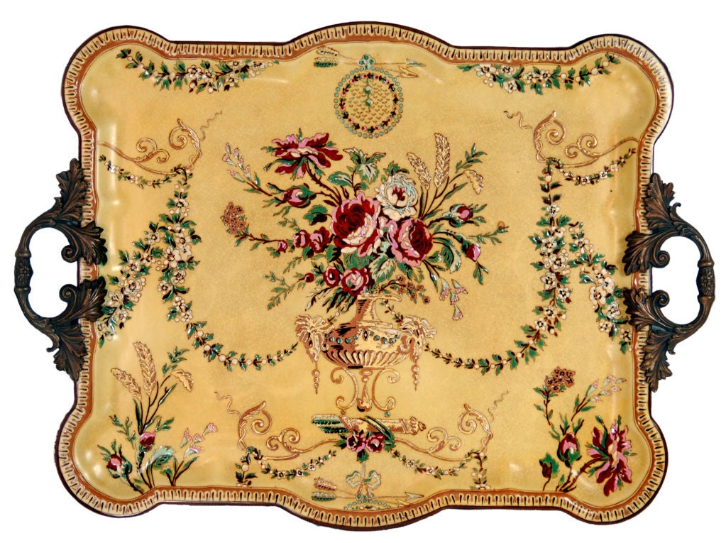 Chinese export porcelain with faux cloisonné top with famille rose motif. The tray is removable and has wonderfully decorative cast bronze handles. 18th century French provincial style.