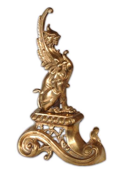 What is significant about this pair of French Griffin andirons with scroll feet is that they are a pair. Griffins are a mythological creatures that are said to mate for life and if either partner died, then the other would continue throughout the