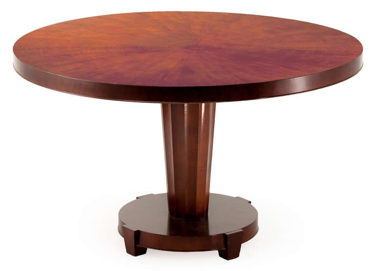 This highly lacquered circular burl game table with caramel leather barrel chairs on casters will find a handsome home in library, game room, cigar room or whatever suits your fancy!
