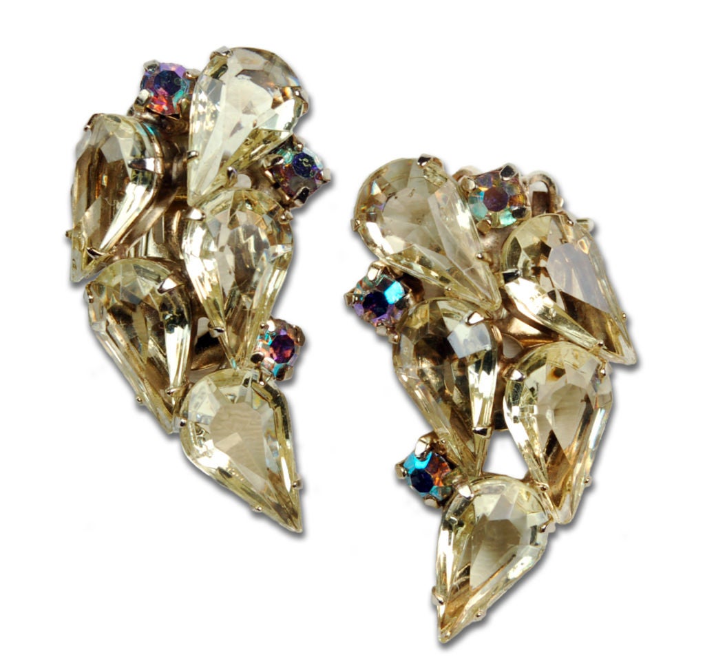 A pair of clear sparkling tear drop cut rhinestone spray earrings by Weiss jewelry. The fabulous rhinestones used in these earrings were imported from Austria.