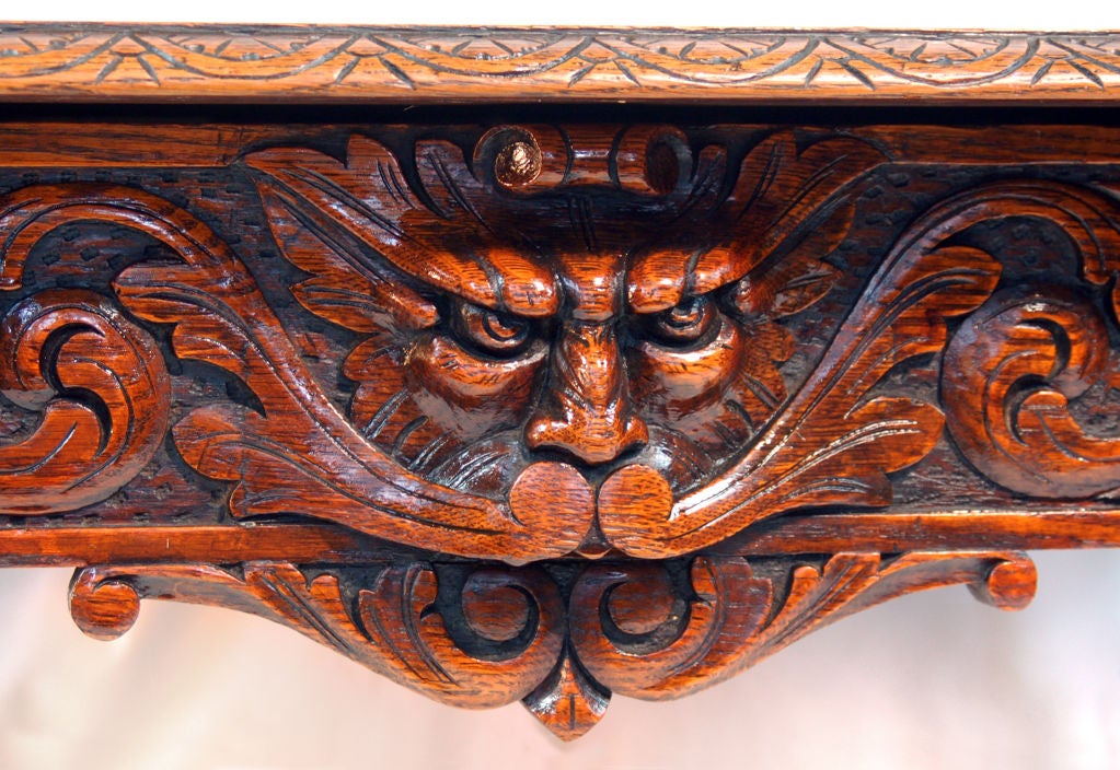 American 19th Century Carved Oak Table with Grotesque Faces For Sale