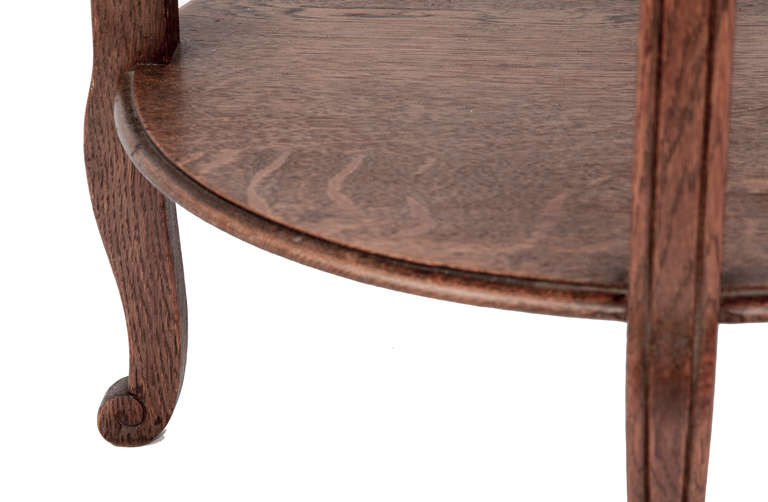 Beautiful strong, oak, round occassional table with second tier below, edged, tops and tapered cabriole legs