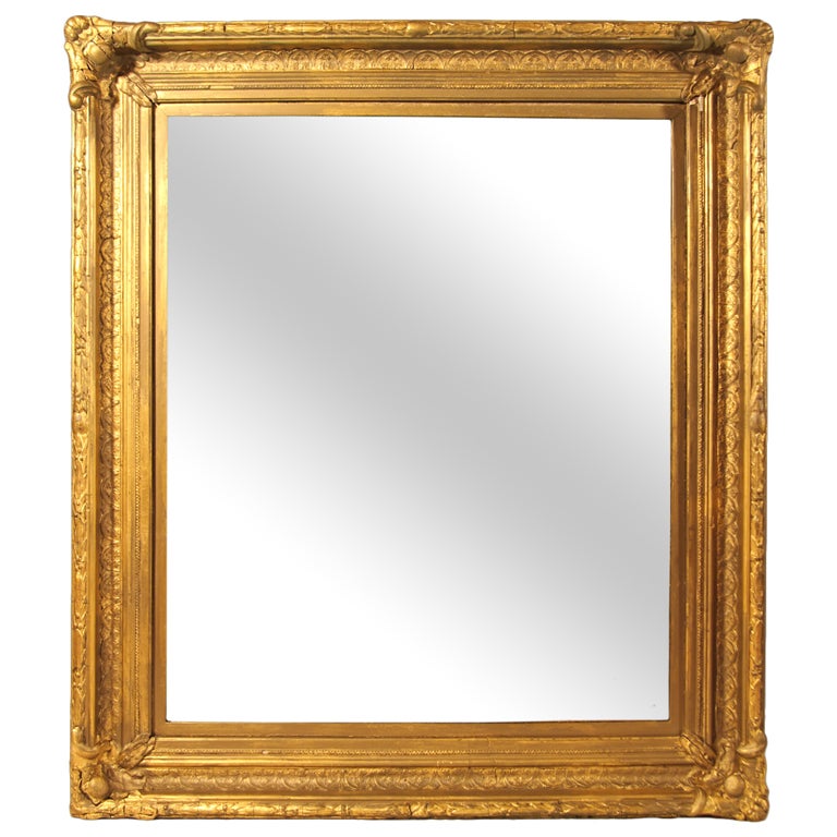 Miroir baroque en bois doré sculpté du 19e siècle