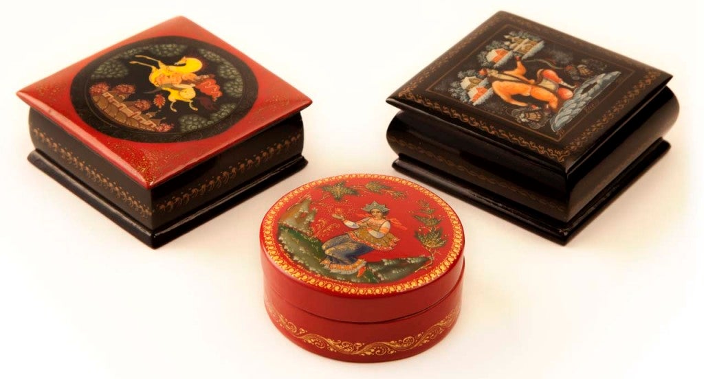 Three beautiful hand-painted Russian jewelry boxes with lacquered finish.
