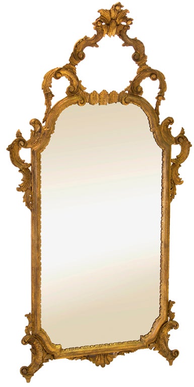 Beautiful gilt wall mirror very old hand-carved wood.