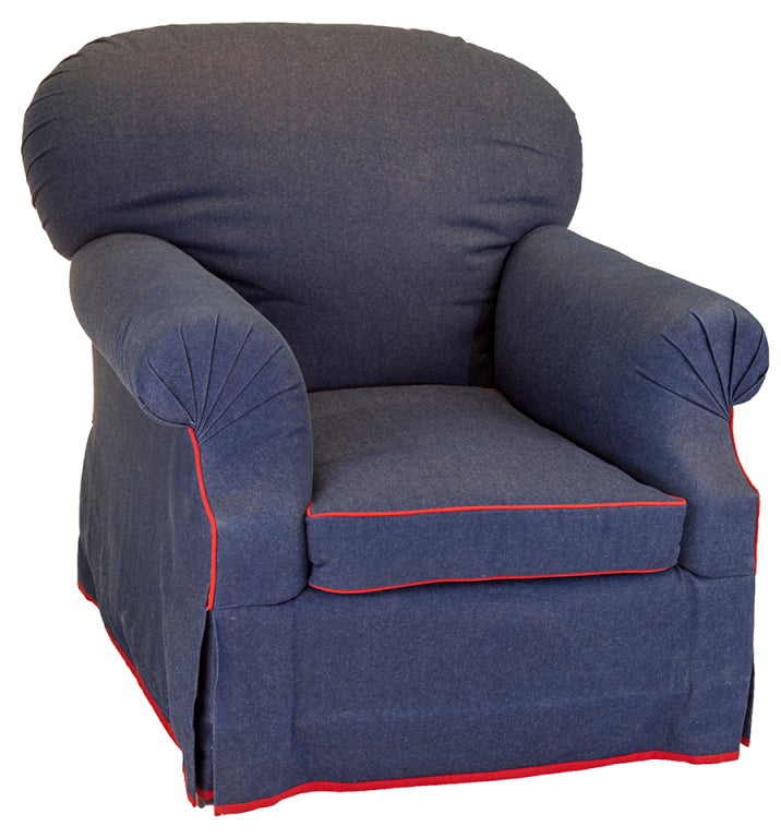 Big cozy papa bear chairs in the style of Ralph Lauren. Denim with red cotton piping, tucked arms and back on big round casters. Great for boys room, dormitory room. Sturdy and nearly indestructible.