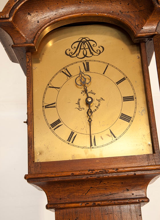This beautiful walnut granddaughter clock made in Spain is tall and slender and will fit in any corner location.
