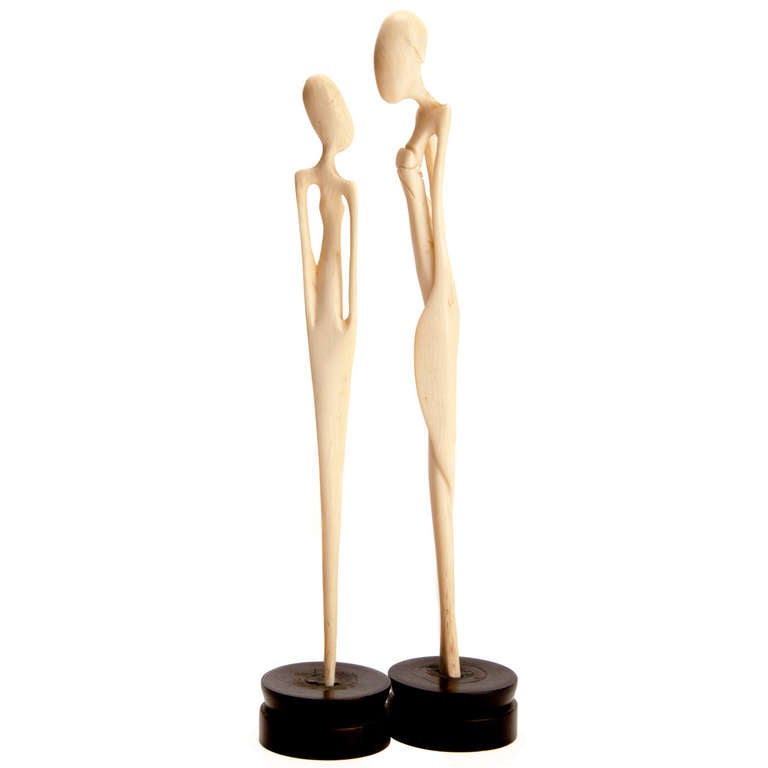 Figuras tribales de madre e hija africanas