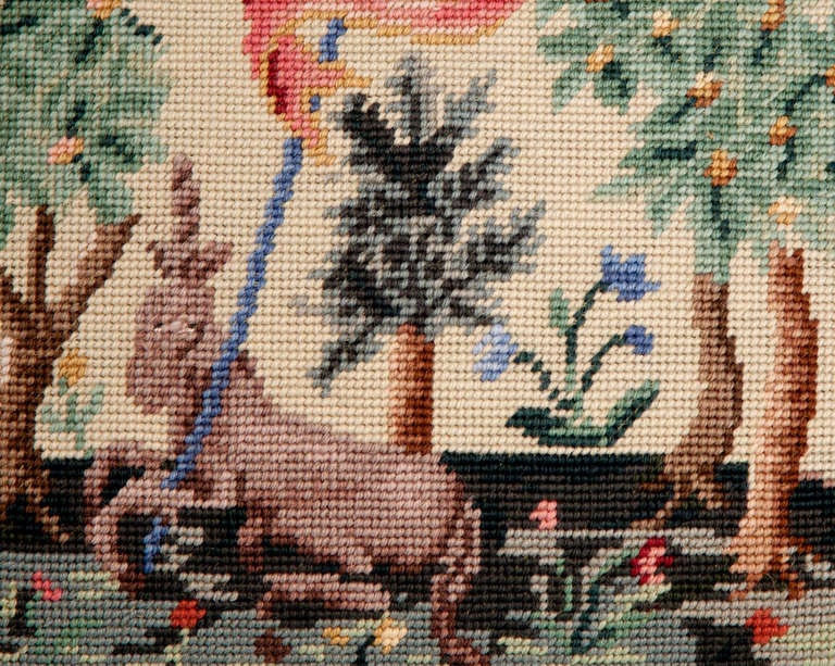 Classic pair of Medeival Style lion and unicorn tapestry pendant needlepoint pillows backed in taupe striate velvet welt.