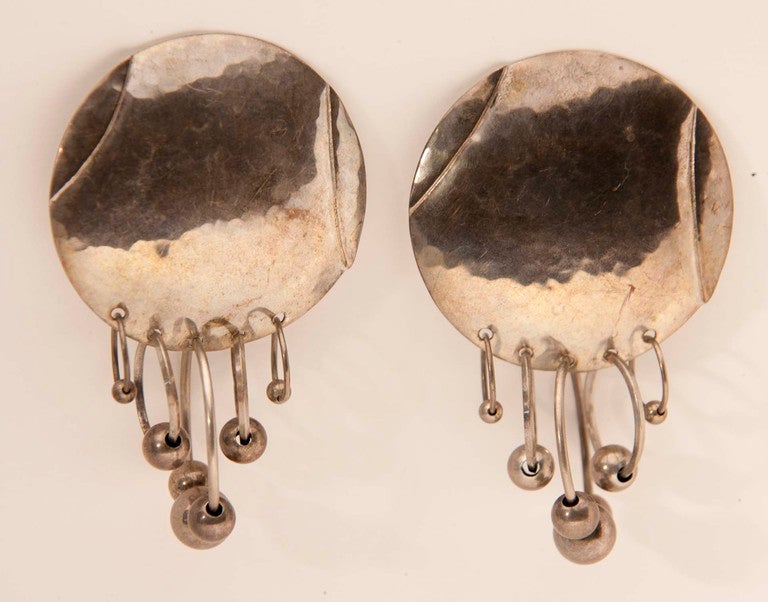 Pair of vintage India handmade silver hammered with hoops and silvers balls.