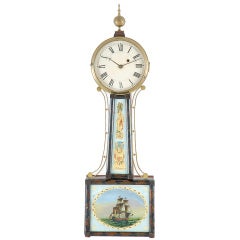 A Period Banjo Clock, Stenciled With Reverse Painted Glasses