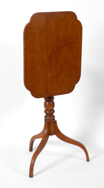 A wonderful New England tiger maple candlestand